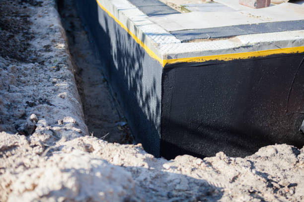 Professional Waterproofing technician working in Lansing, IL